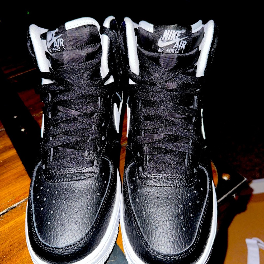 Men’s Size 7  Women’s 8.5 Nike Air Force 1s highs Black and White.
